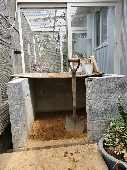 土をだす。そして入れる。の写真